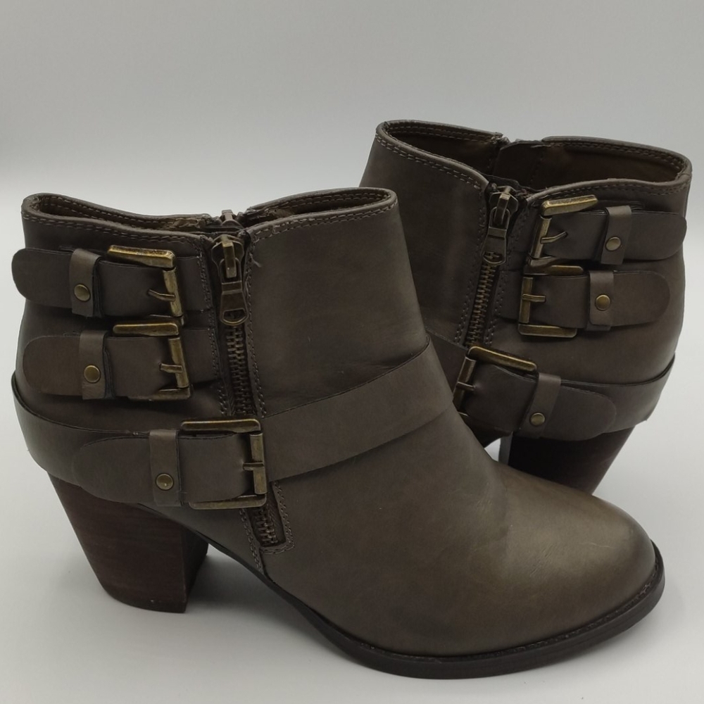 Woman's grey ankle boots with buckles and zippers